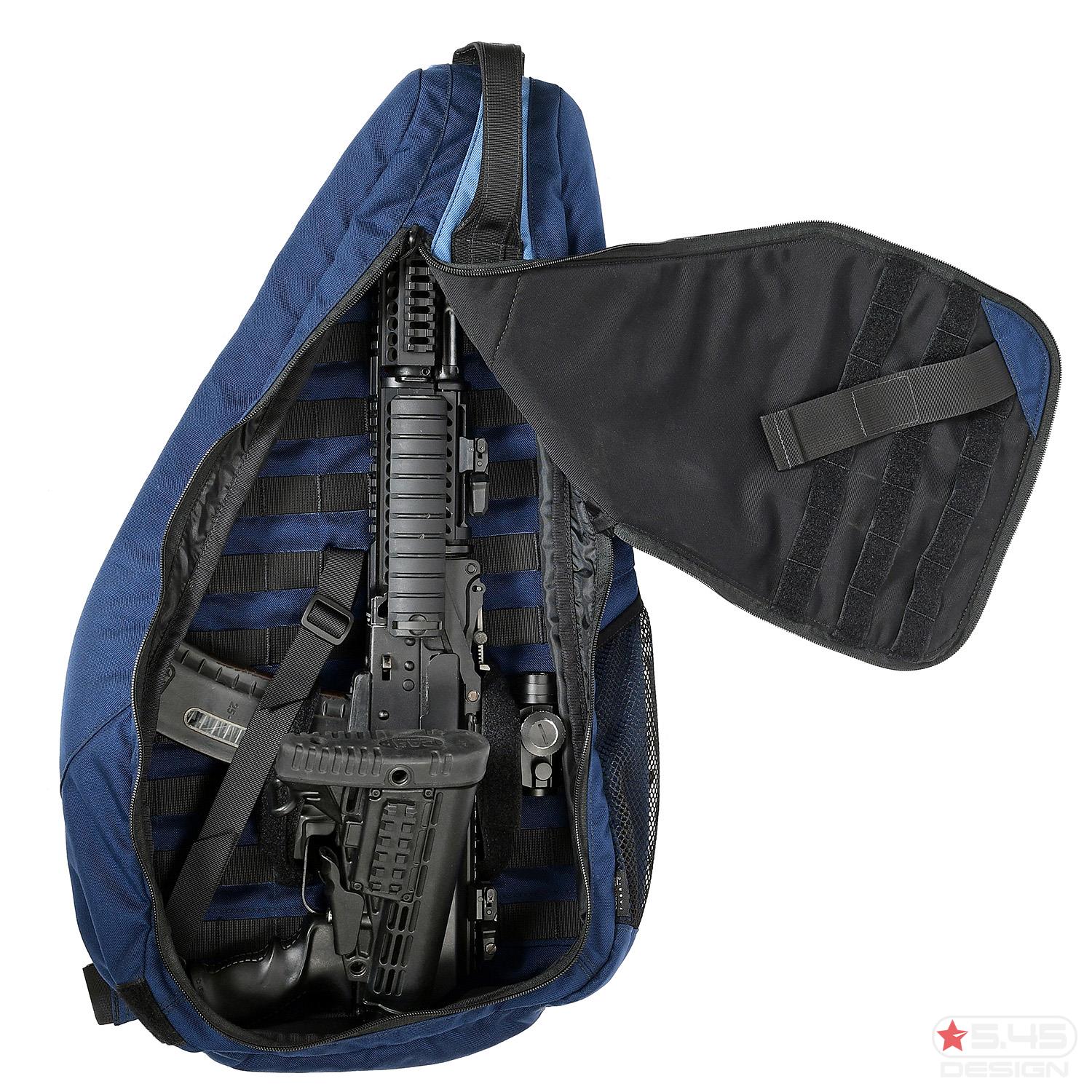 В скрытом кармане, расположенном в спинке сумки, предусмотрены прорезиненные соты, предназначенные для дополнительных магазинов оружия.